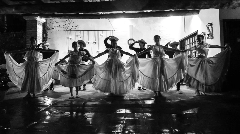 After coffee, we toured a breathtaking family owned ranchero that was converted into a boutique hotel. The family was delightful, the space dreamy, and the atmosphere unforgettable. As it poured rain, local high school students performed a traditional Salvadorean dance for us. I got soaked shooting this, but was so, so happy. We ended the evening dancing hand in hand with them, grinning like Cheshire cats. 