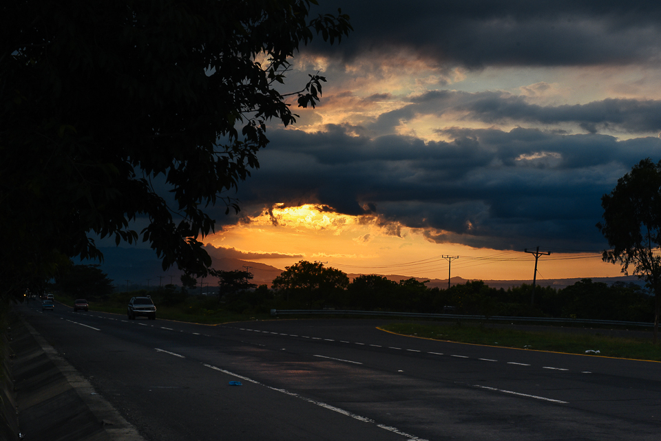 Sunset from the side of the road, en route back to San Salvador and excited to sleep in the same bed for more than one night. 
