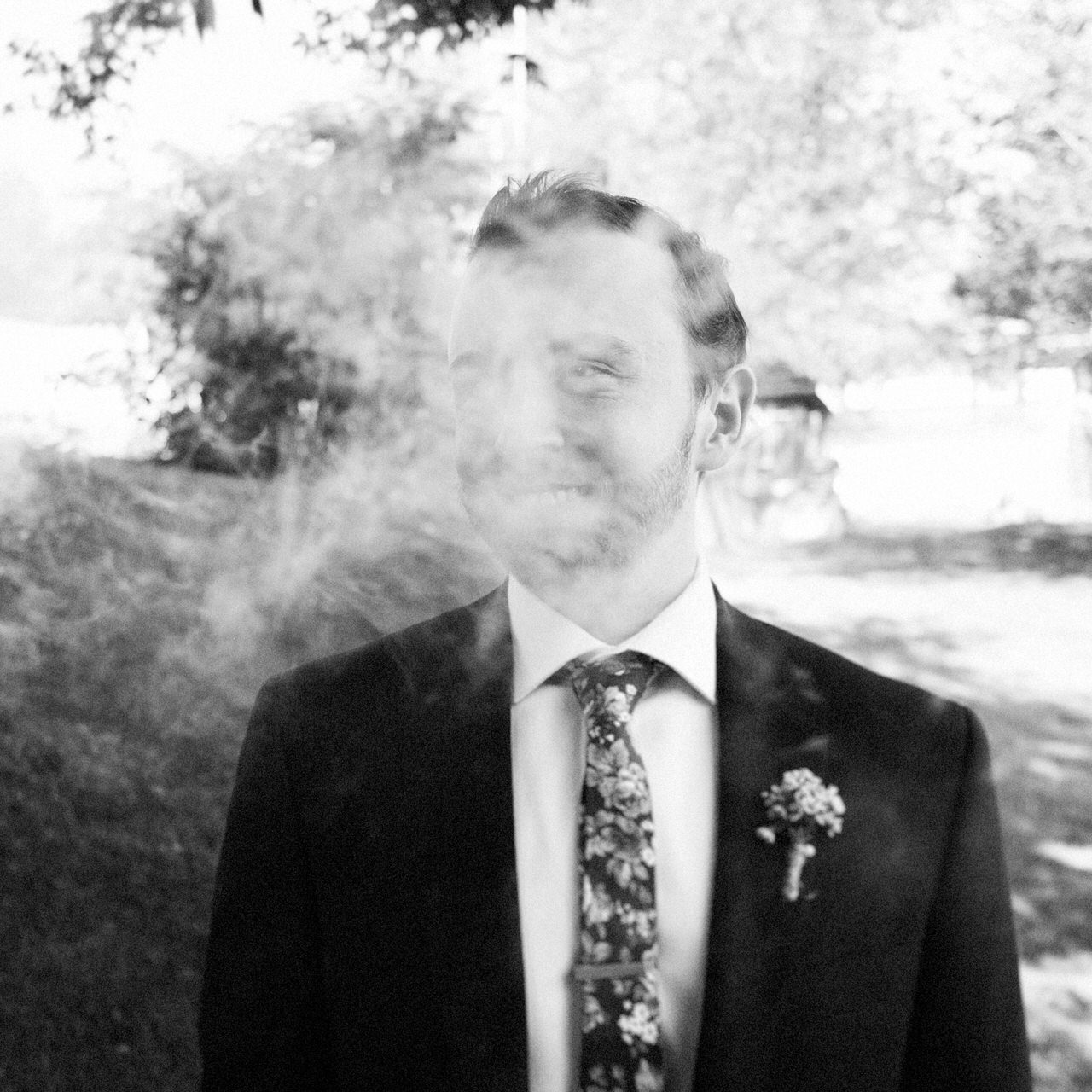 Hip groom smoking portrait.jpg