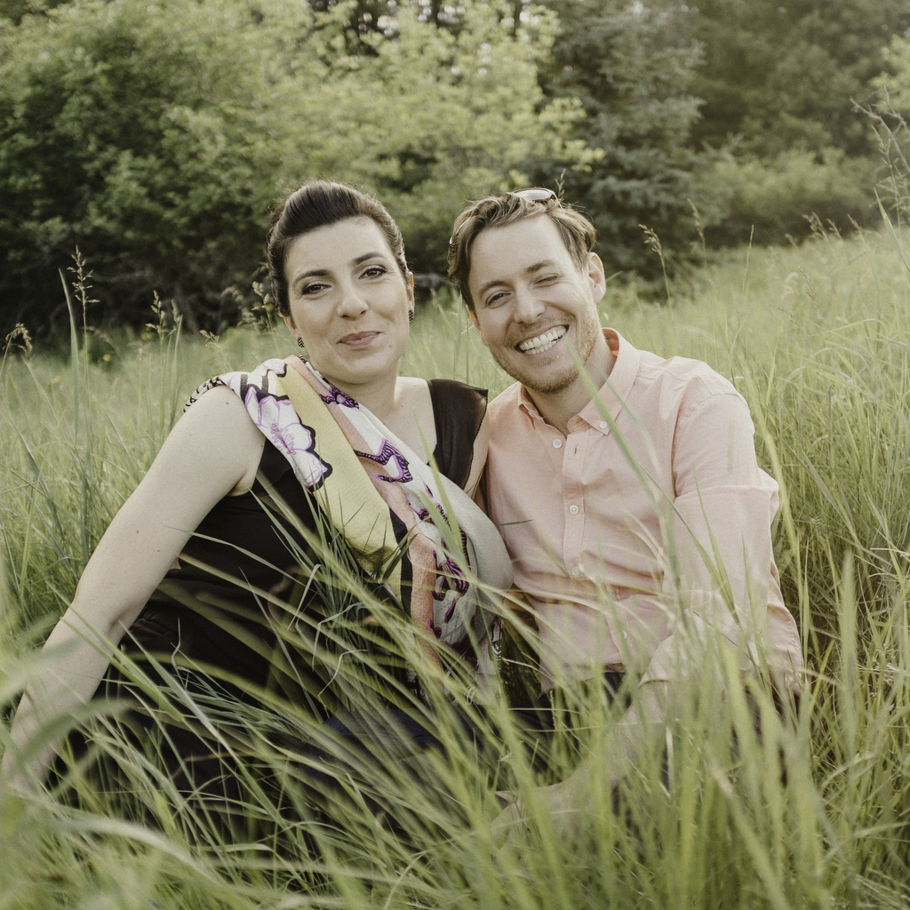 Engaged couple in field during their Wakefield Adventure Session.jpg