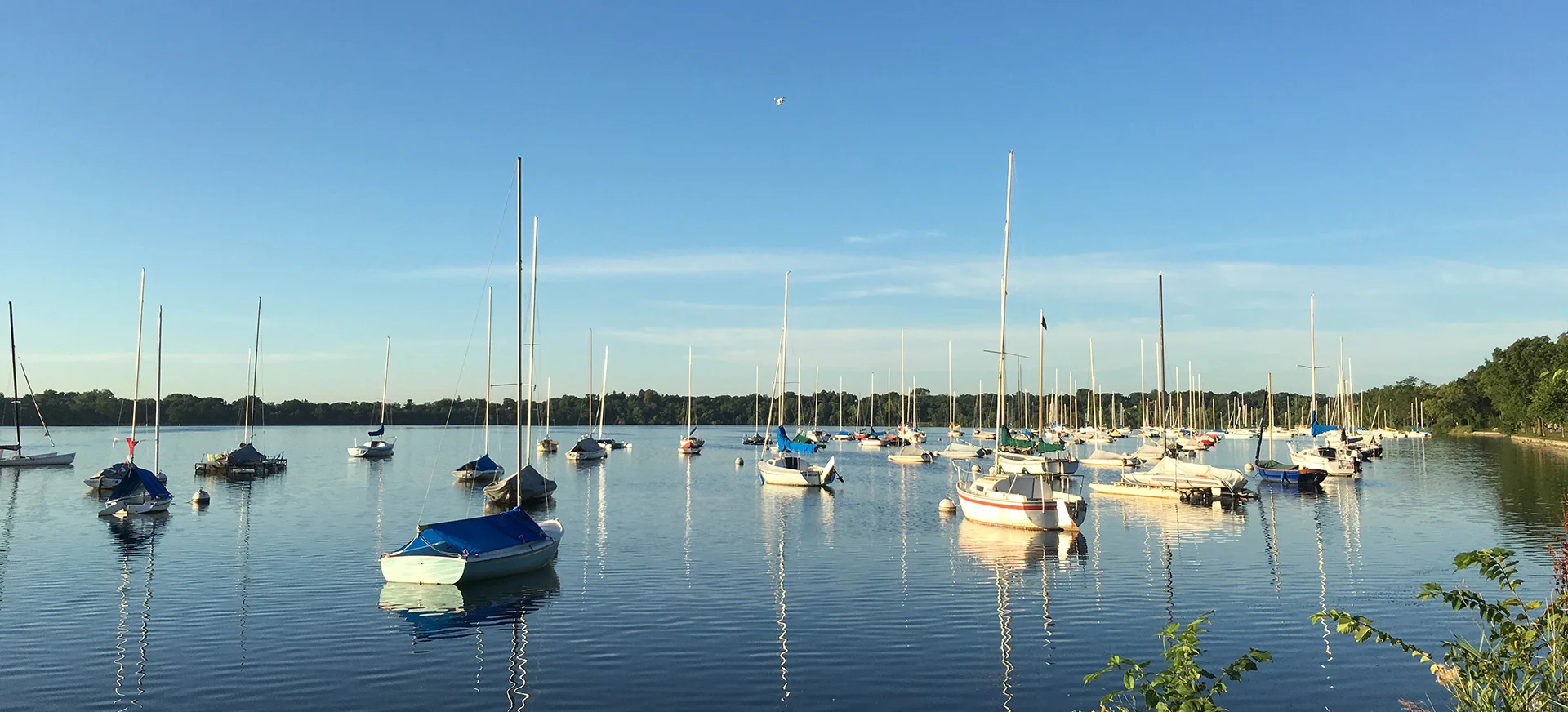 Our drone flying high above the sailboats docked at Lake Harriet.