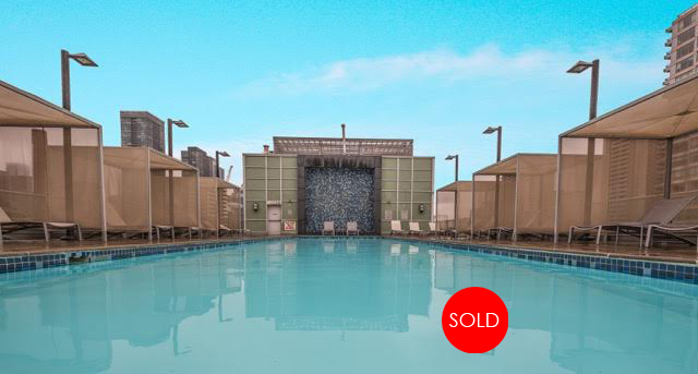 Stunning rooftop pool with private cabanas and a hot tub.