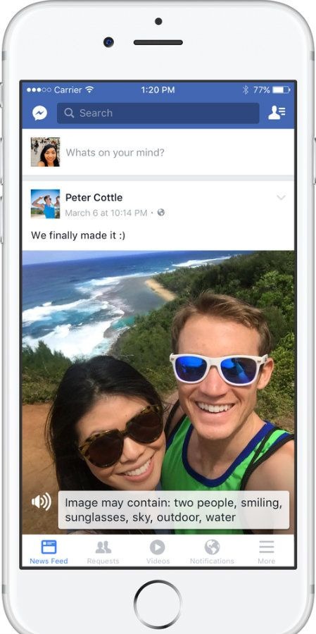 Picture of a woman and man standing near the ocean in a picture on Facebook