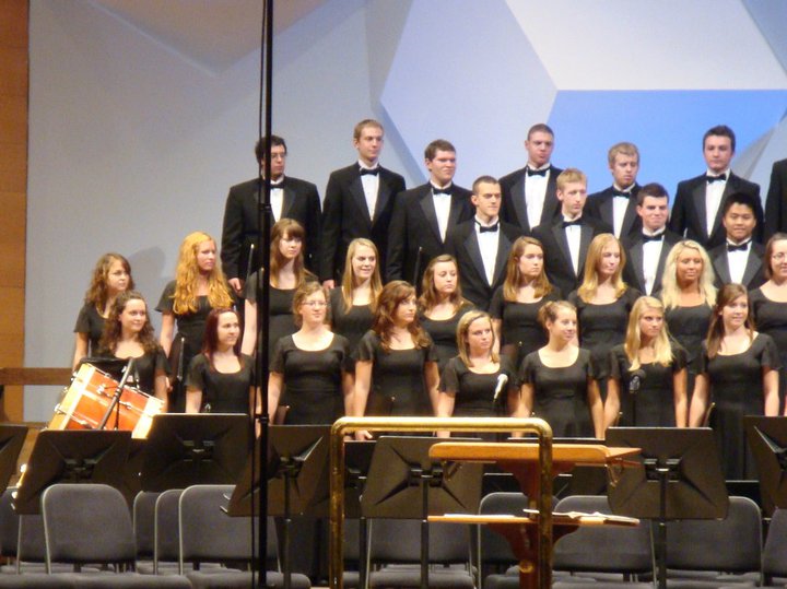 Jon is in the last row, 5th person from the left.