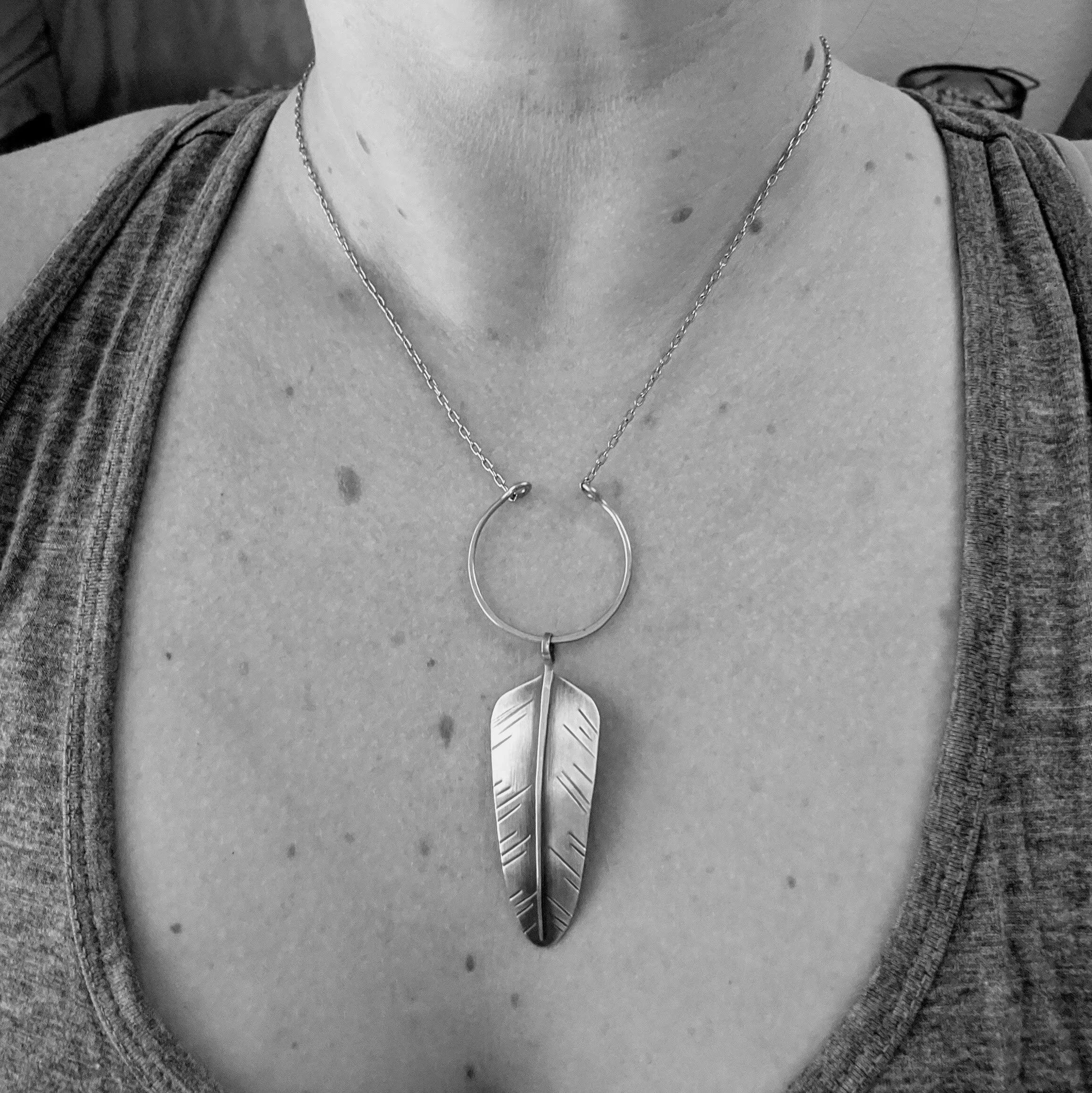 nature-feather-earrlings-sterling-brass-powerful-model.jpg
