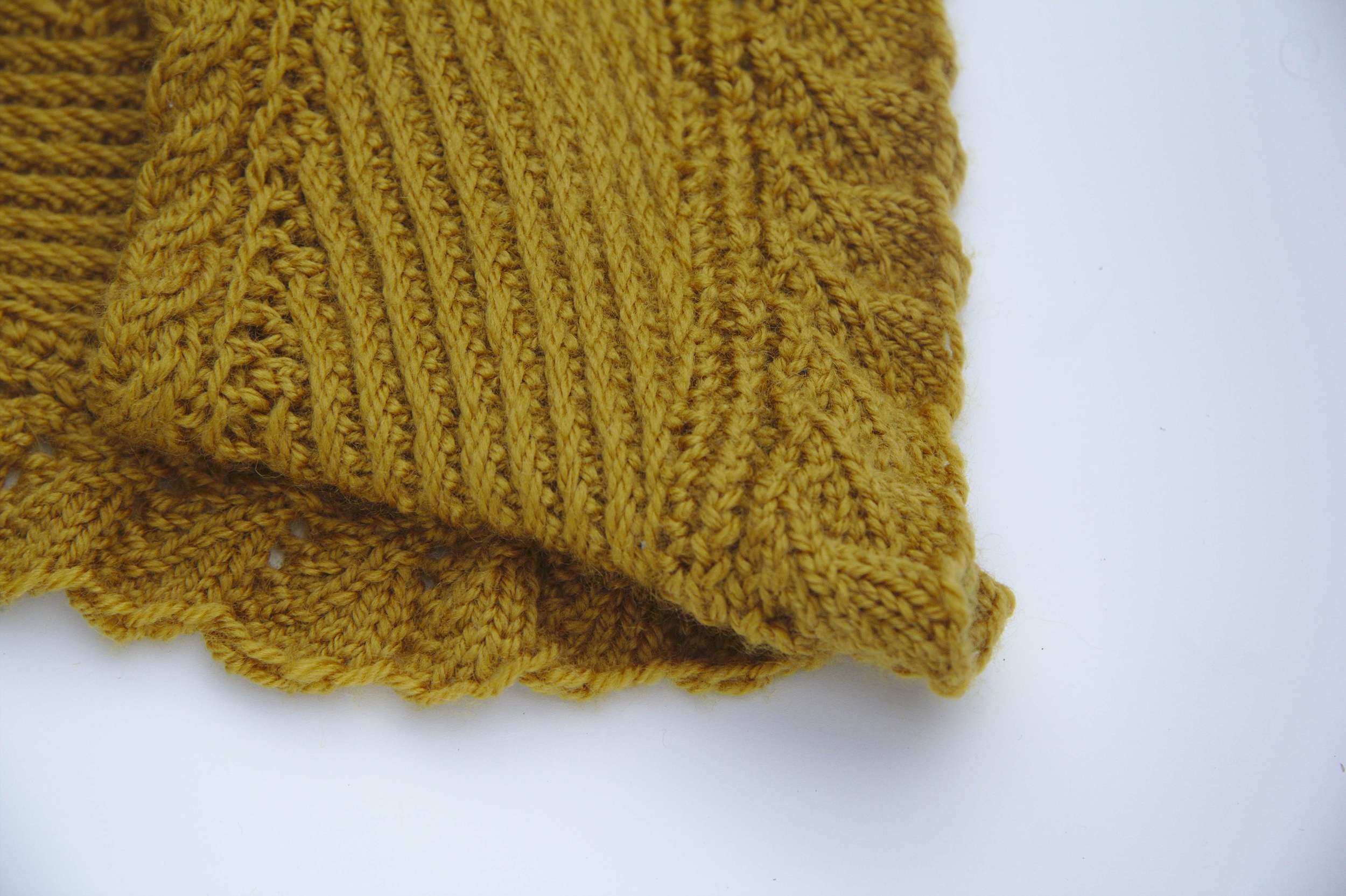 From top to bottom: cables, slip stitch and lace.