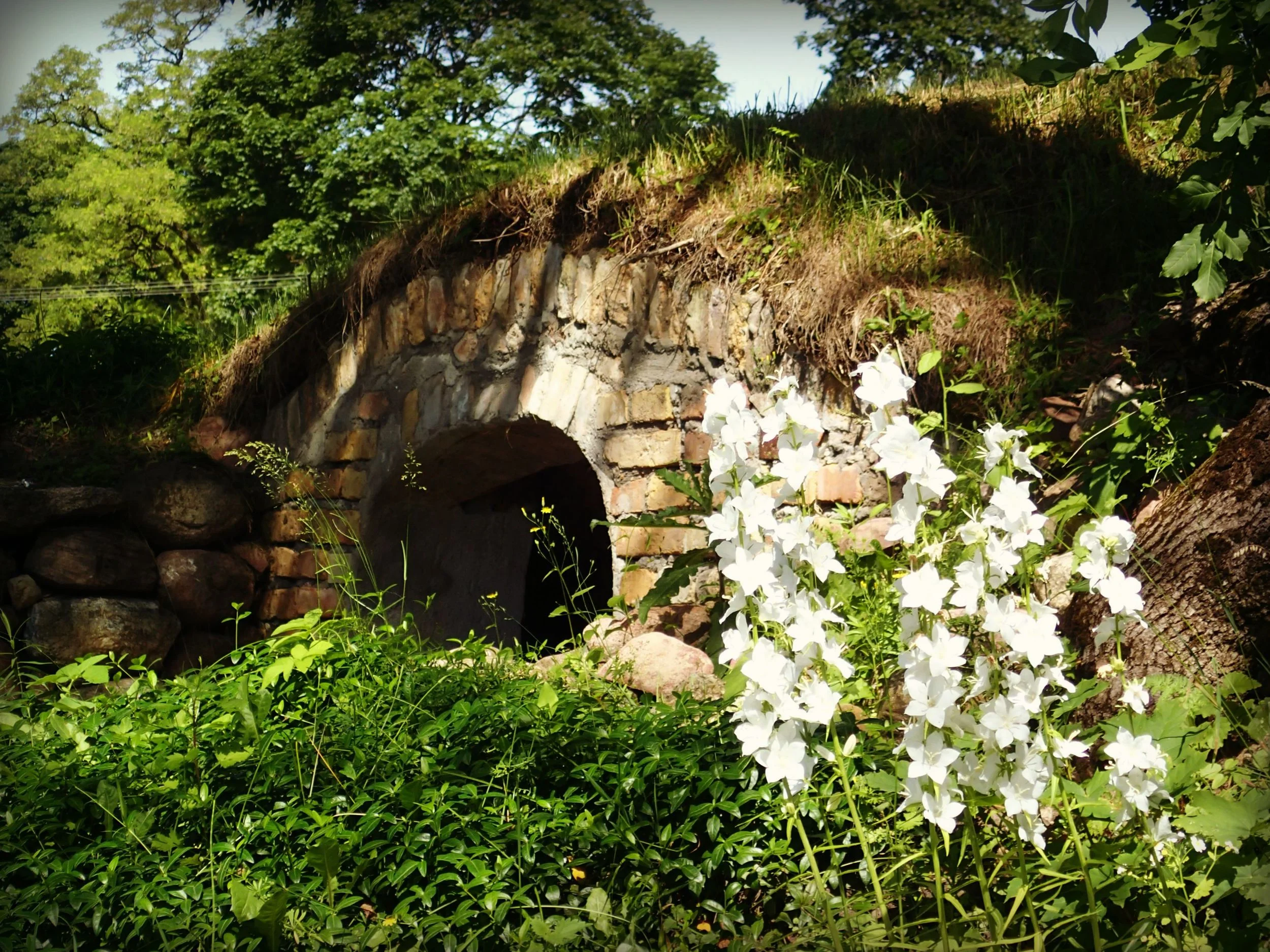 Polish Hobbit Hole? Nope, it's where they store their trash at our hotel, Folwark Hutta. Our last day in Poland before moving onto Lithuania.
