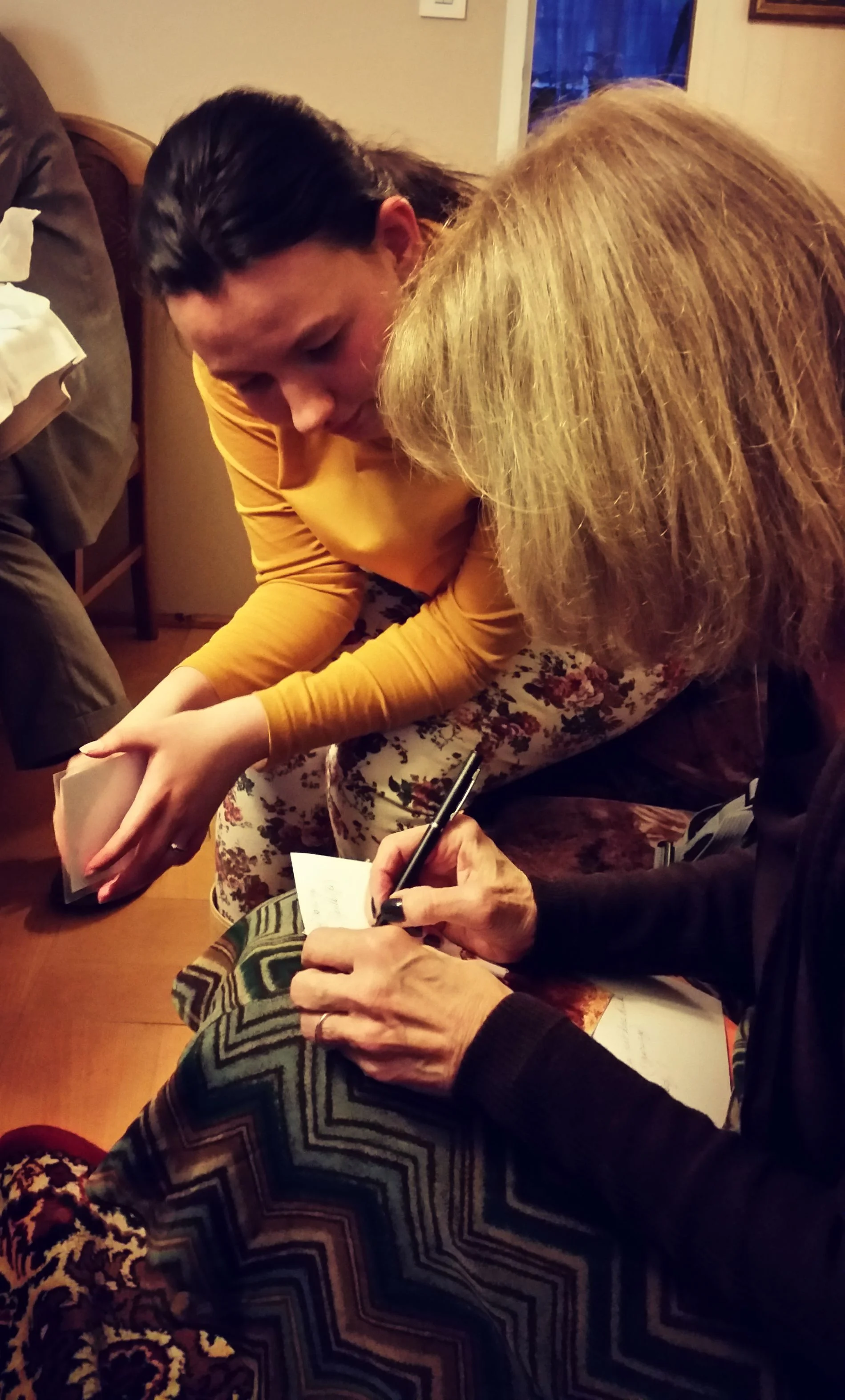 Now we begin One of the main purposes of this genealogical trip: Sitting down with Agata (on left), my mom begin writing tons of notes to help fill in all of the gaps in our family's history. Agata is the descendant of my great grandmother's sister.