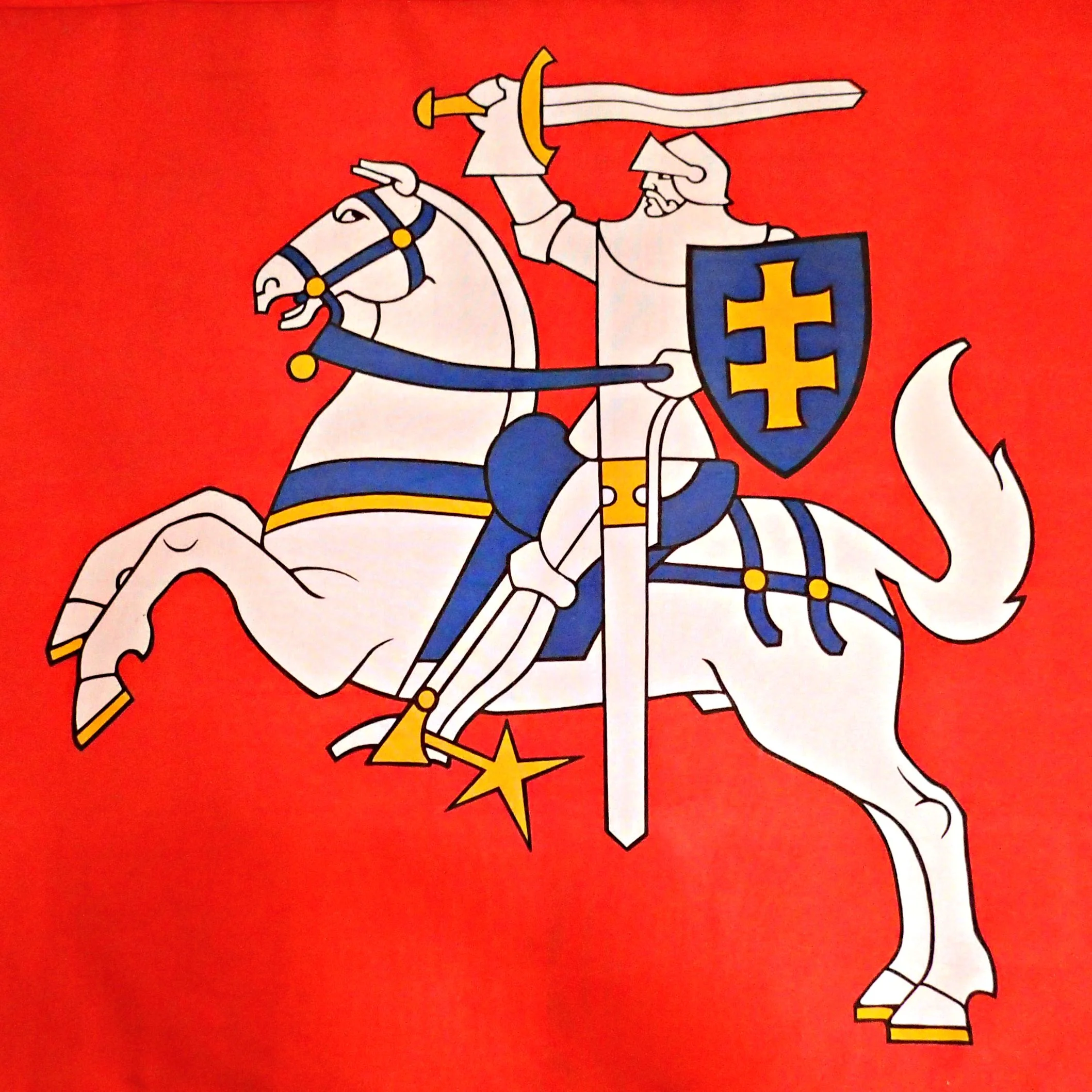 While visiting the castle, I took this photo of the Vytis (the Lithuanian war flag) flying above focusing on its heraldic image in the center. Recorded in 1410 at the Battle of Grunwald, it is one of the earliest known Lithuanian flags.