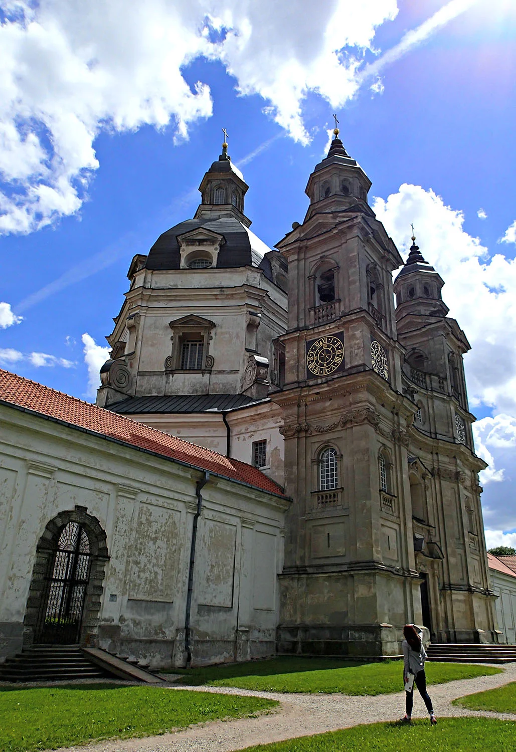 My favorite picture of Karyn. I love how her body is tilted in line with the church & the angle she made as she shielded her eyes from the sun. Founded in 1662 , Pažaislio Vienuolynas ir Bažnyčia (Pažaislis Monastery & church) is the largest monastery in Lithuania & a beautiful example of Italian Baroque architecture. According to the literature in the church: "The monastery's church was damaged by the horses of Napoleon's army which was based in the complex. In 1832, the monastery was closed by Russian authority & later converted into an Orthodox church. The author of the Imperial Russian national anthem was interred there in 1870. In 1915-1918, a German war hospital was established in the monastery. After 1920, the ruined monastery returned to Roman Catholics & was restored by sisters of the Lithuanian convent of St. Casimir. After WWII, the Soviet authorities converted the church & monastery into an archive, a psychiatric hospital & then an art gallery in 1966. In the 1990s, the monastery was returned by the newly independent Lithuania to the nuns of the convent & fully reconstructed."