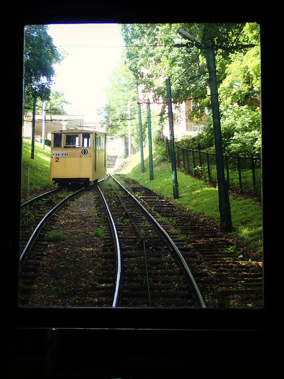 My 1st ride in a funicular. In this photo, we're inside one funicular going up the hill peering out the door to view the other funicular coming down the hill. I kid you not, the entire ride we sang the only part of Funiculì funiculà that we knew, the chorus. To really get into the mood of this, I'd suggest that you watch this YouTube clip which begins with the famous chorus & includes the lyrics.