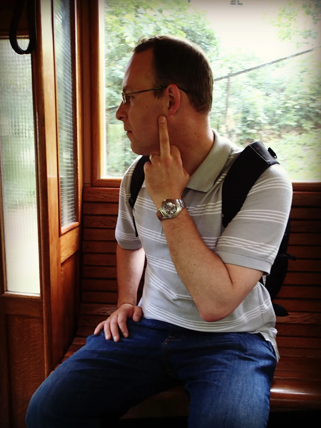 You're never too old to tease your sibling. In the funicular, here is a view that I often saw in my childhood...my brother flashing me the finger while calmly looking at my mother. My mother never had any clue when we would do this to each other since from the front, it just looks like we're touching our faces. But she'll know now. Busted, Doug!