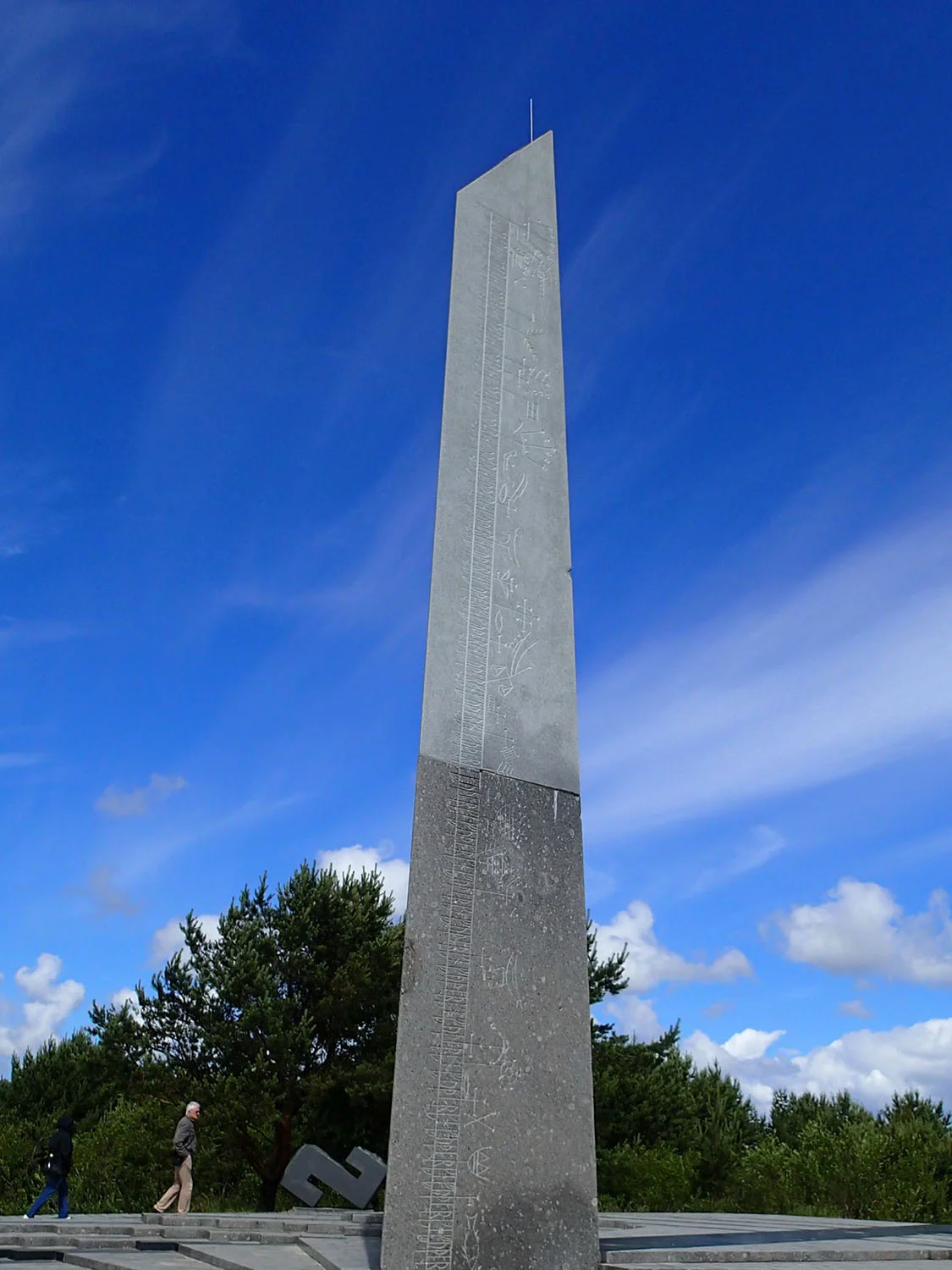The summit of the dune is marked by one of the largest & most mathematically correct sundials in the world. Dotted with runes & pagan symbols, this 39 ft tall solar clock rises into the sky in the only Lithuanian location where you can observe both the sun rise & set. Vidimantas (our genealogist) & his wife, Hilda can be seen on the lower left.