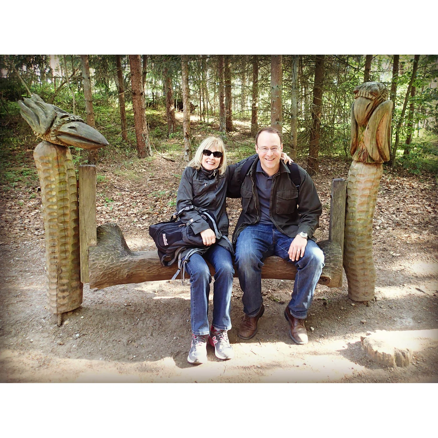 Occasionally, you just have to put up a photo of your mom & brother because you love them...& because it's odd that they are sitting so happily between two carved birds.