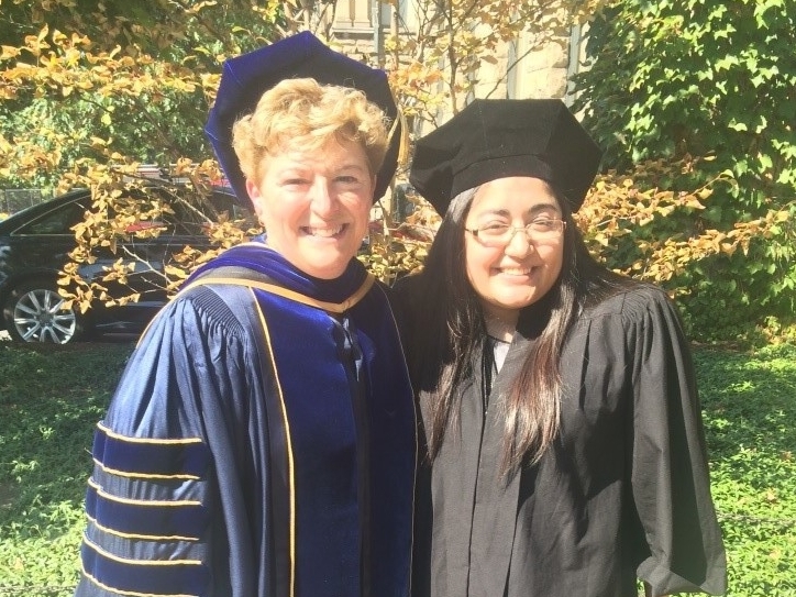   Nancy poses with Dean of Cornell’s College of Agriculture and Life Sciences, Kathryn Boor (left). This photo was taken at President Garrett’s inauguration ceremony on ­­September 18th, 2015 where Nancy was privileged to walk and carry the symbol fo