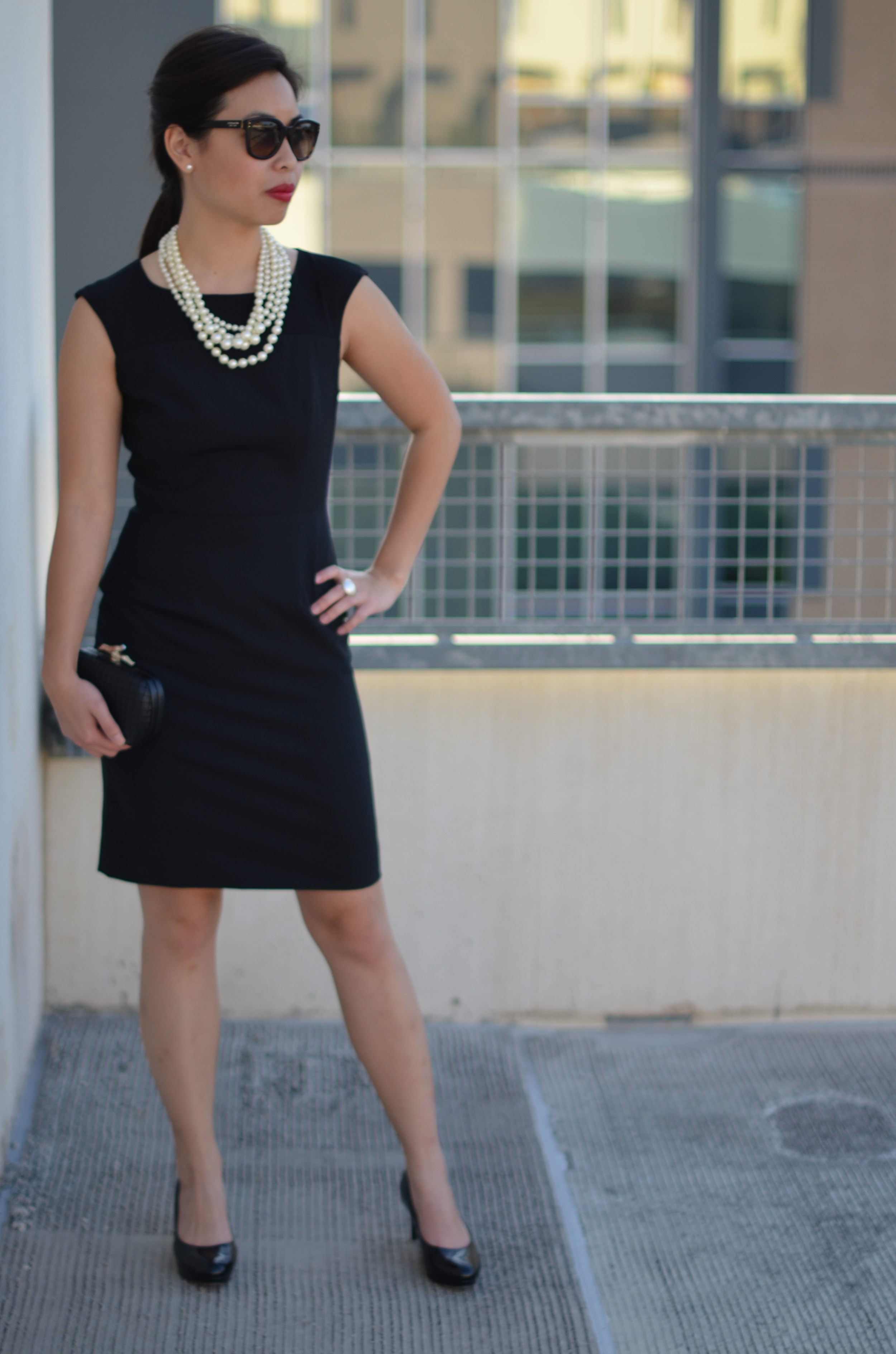 black dress with pearls