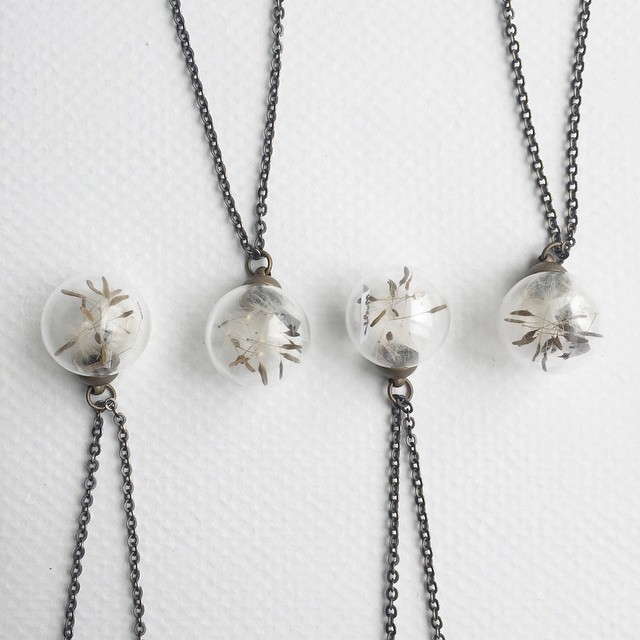 Just made some Make a Wish / Dandelion fluff glass sphere necklaces. I picked the dandelion seeds last weekend at Hoyt Arboretum, here in Portland.