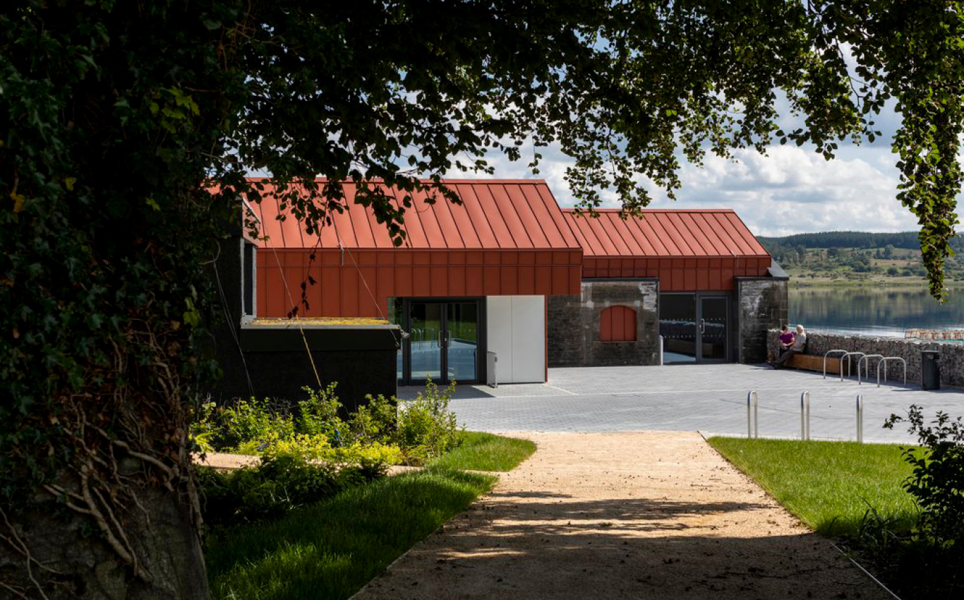 The new building has an industrial appearance in keeping with the history of the area, but one which adds an aesthetic emphasis to detailing. The simple pitched-roof form of the existing building has been extended across the new structure, and new walls and roofs are clad in red steel. Within the footprint of the original building the new form emerges from within the old masonry shell; a visual expression of the continuing development of the site. Photos: © Angus Bremner