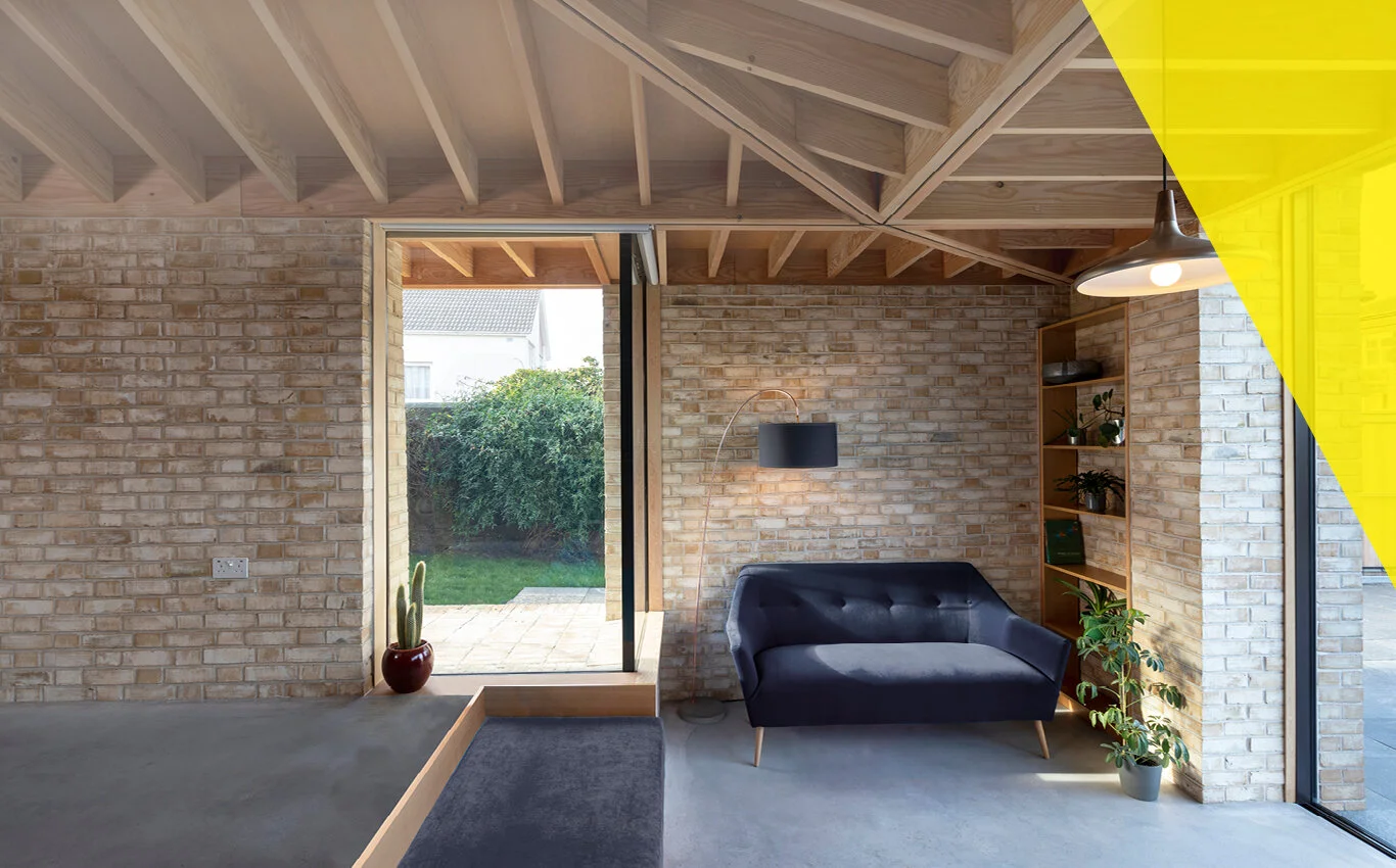  We had a high expectation of craftsmanship, just like the Arts and Crafts designers would have done in their day. We avoided concealing construction behind plaster finishes, choosing to detail the timber roof so that its construction is visible and selecting a relatively light tone brick that’s exposed internally. This extra visibility put pressure on many details that don’t normally concern us like stray fixings passing through roof decks or swags of electric cables normally concealed by plaster board.    As you step into the extension, you pass the tidied up original brick of the external walls. People often forget that bricks were manufactured in plenty of places in Scotland, not just in England. These ones had ’Niddrie’ embossed on the inside face.   Winner of Scottish Design Award 2020 low cost project and commended in the Edinburgh Architectural Association awards 2020 Small Project category.   