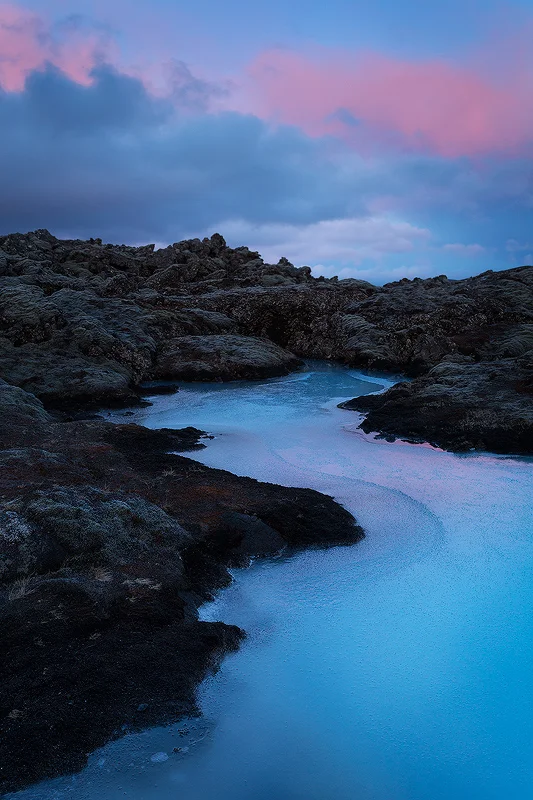 Blue Lagoon, Iceland. This water is geothermally heated, so the fact that it is frozen gives a queue as to how cold it was on that particular morning. Good clothing choices allowed me to stay outside for this loooong winter sunrise even though it was ridiculously cold.