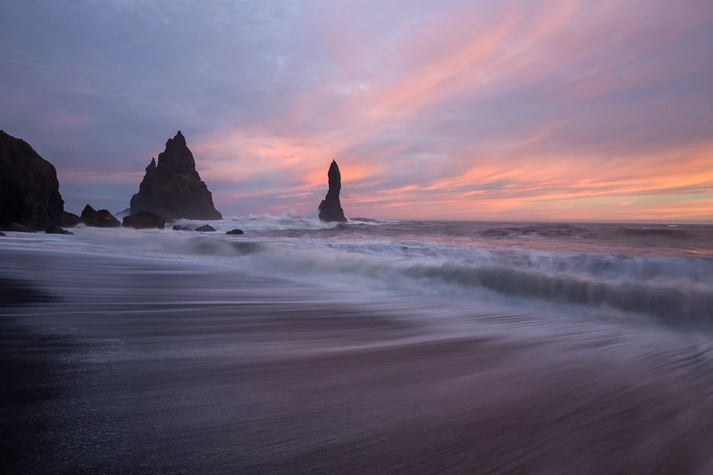 Ocean Motion. A nice sunset on the famous beach in Vik, Iceland