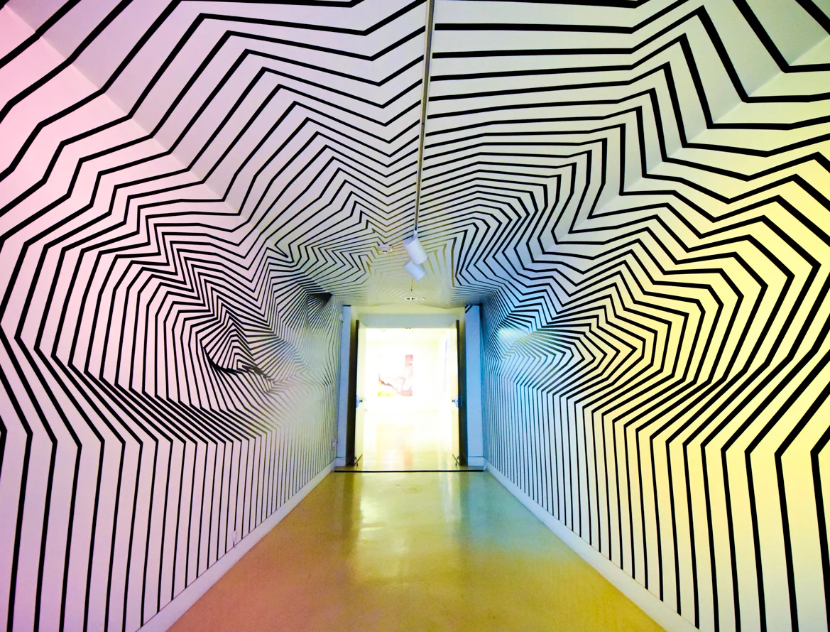 TAM documentation-tape-installation-dimensionalizing-the-hall-3.jpg