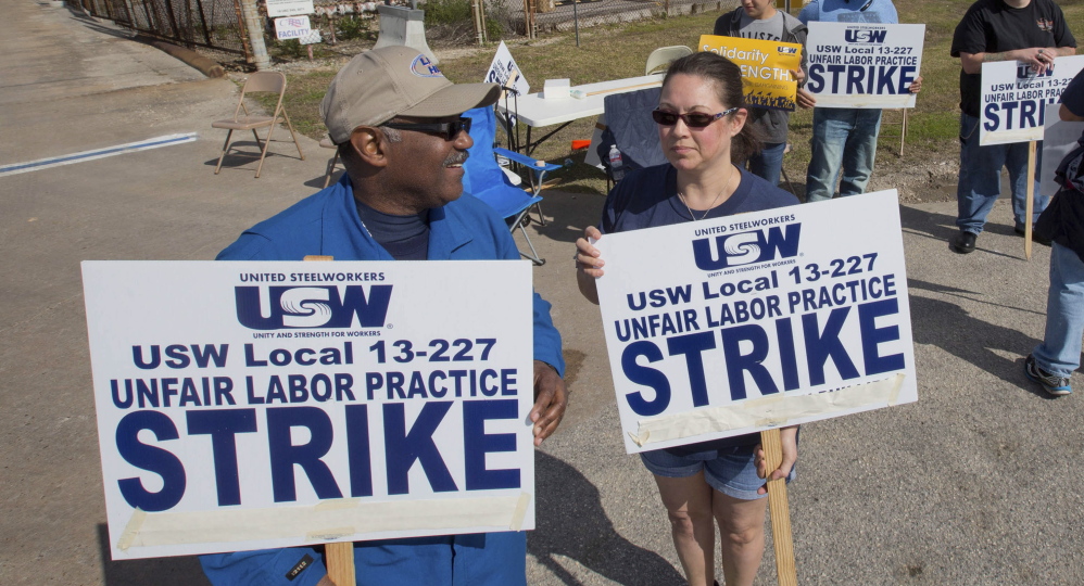 Workers from the United Steelworkers picket outside the Lyondell-Basell refinery in Houston. Reuters