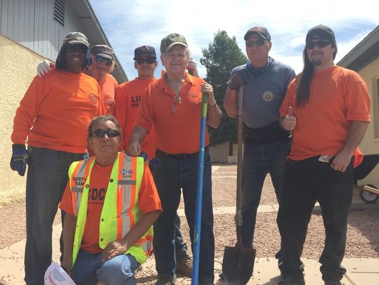 Some of the laborers from the Laborer's Local Union #383 volunteered their time to paint and landscape Whispering Sands affordable housing in north Phoenix, April 27, 2016. (Photo: Claire Cleveland / The Republic)