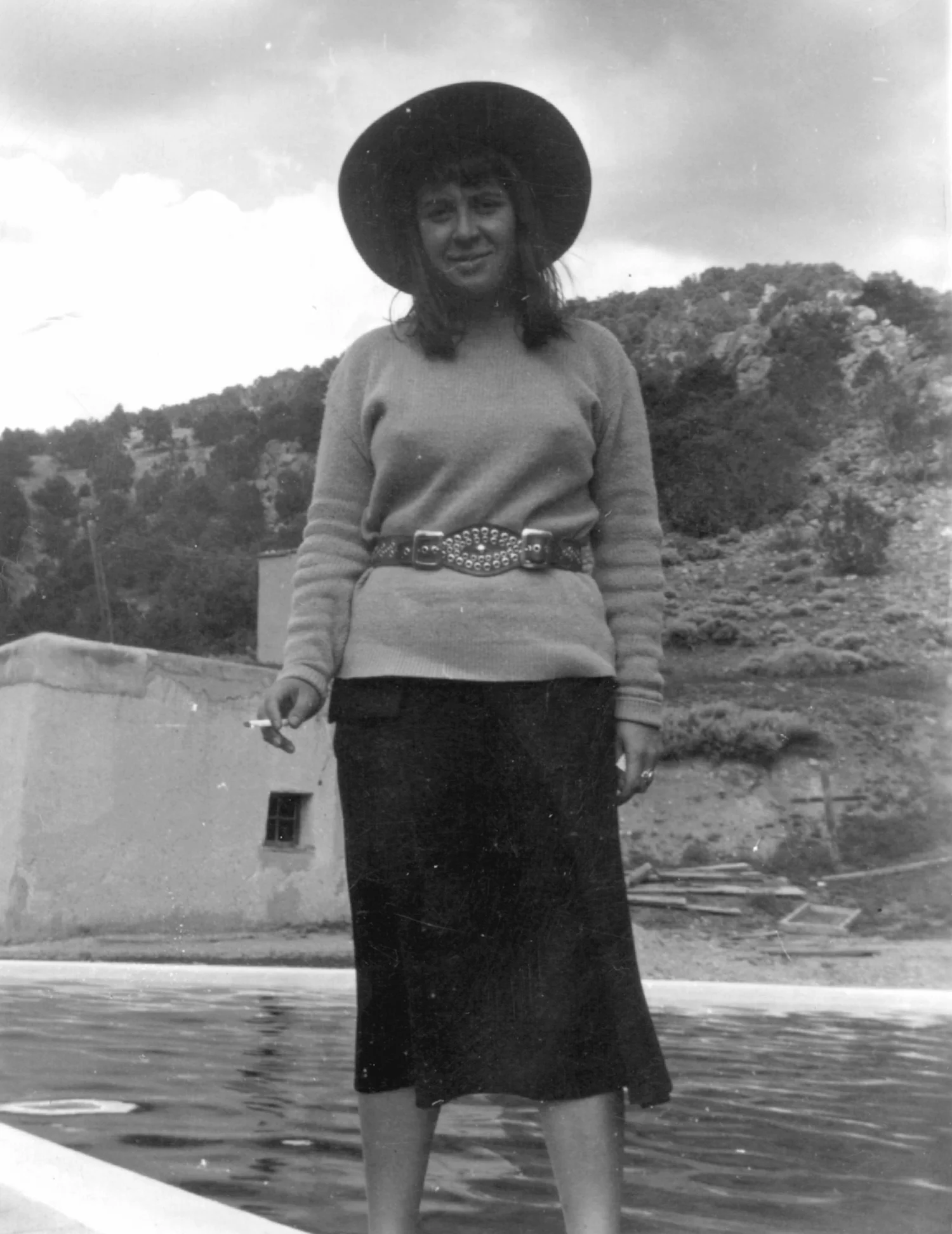Bea at swimming pool in Llano with cigarette (1) (1).jpg