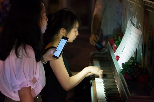 Day or night, people gather around the piano and play.