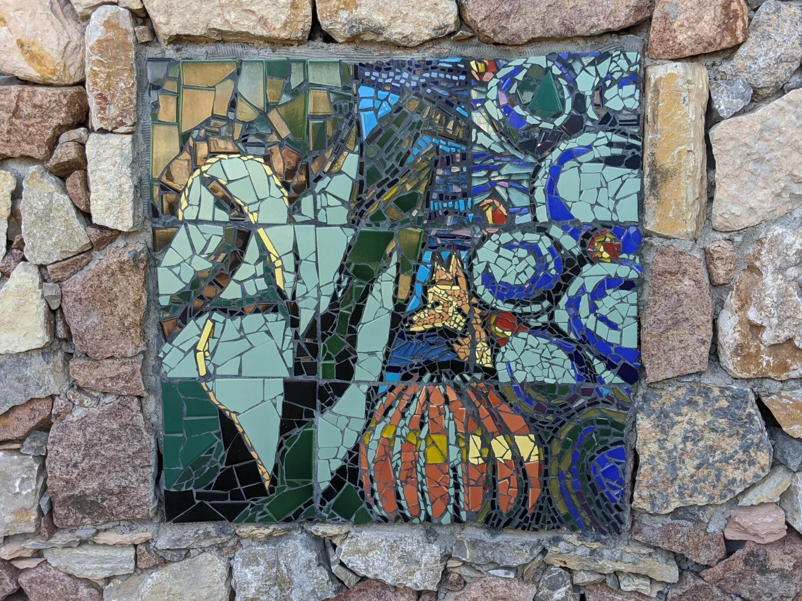 The park is full of artwork. I just happened to come across this mosaic (one of three). It was produced by Lupe Casillas (Lowenberg) in 2009.