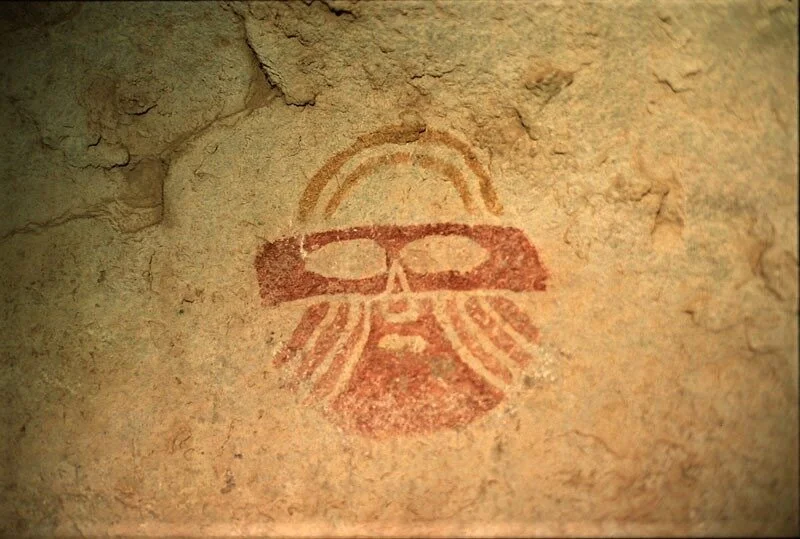 A multichromatic solid mask pictograph in Hueco Tanks State Park. Pictographs like these have been interpreted by archeologists and anthropologists as being related to water and may have played important roles in the Jornada people's petitioning of …