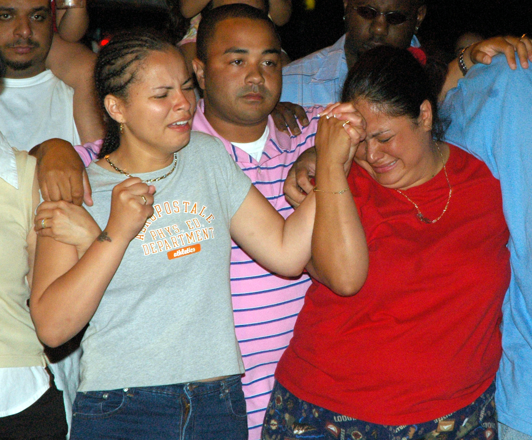 06.25.05 Parents of the three children found in the trunk of car.jpg