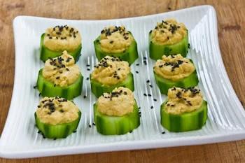 Hummus and Cucumber Appetizer Bites with Black Sesame Seeds