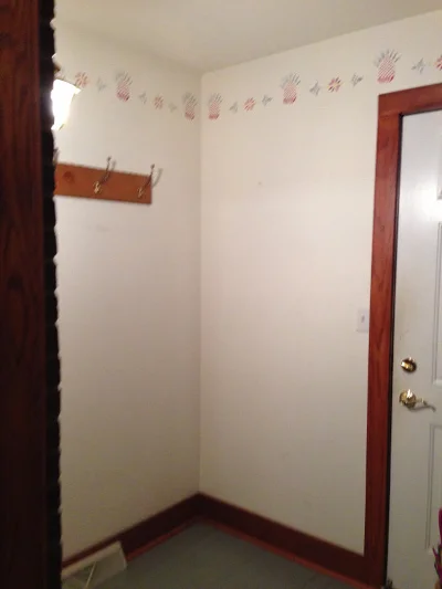 A front "airlock" space that needed a refresh. 