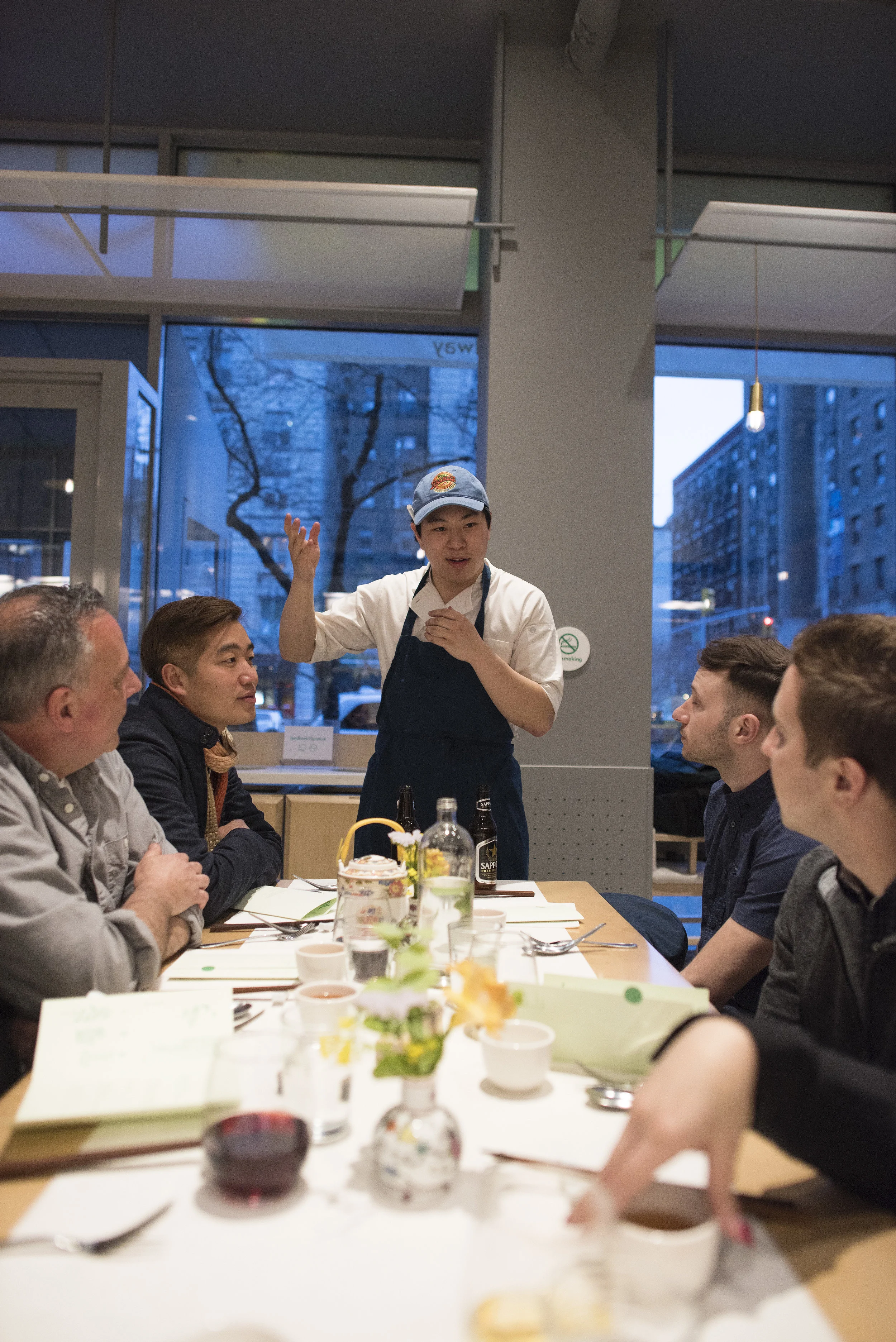 Chef Lucas describing Hu Sihui's "A Soup for the Qan" the book that inspired April's Chef's Table recipes and ingredients.