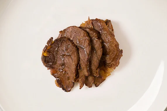 braised beef shank A lot of unpopular, throwaway cuts in the US are premium cuts in China that have very specific, flavorful preparations. Beef shank, in particular, is a tender cut of beef from the leg. The muscle is marbled by tendon, which breaks down during our 3 hour braise with star anise, black cardamom, and cloves. It cools and rests overnight before it’s sliced thinly and served warm.