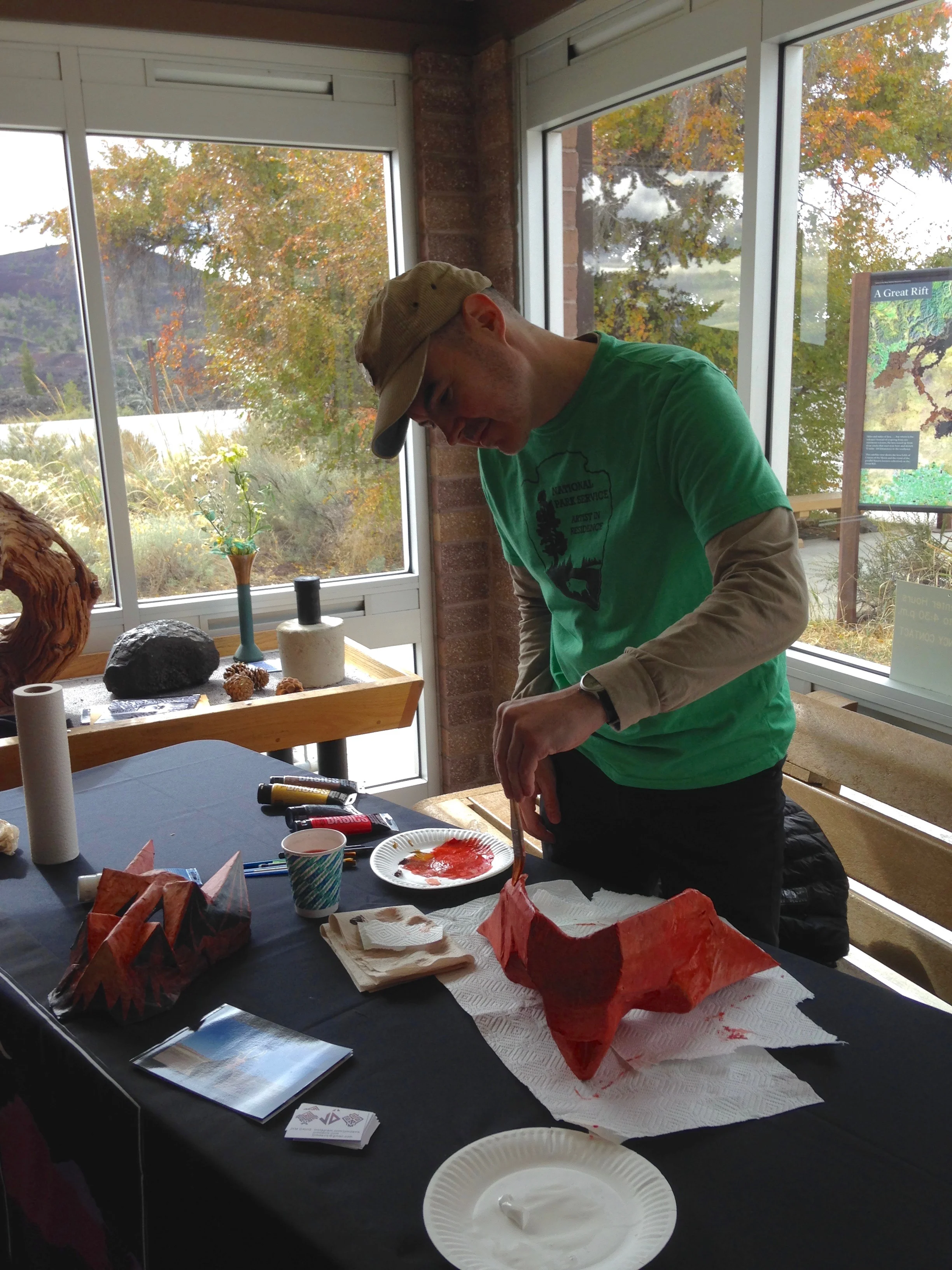 Mask painting demonstration at the Visitor's Center