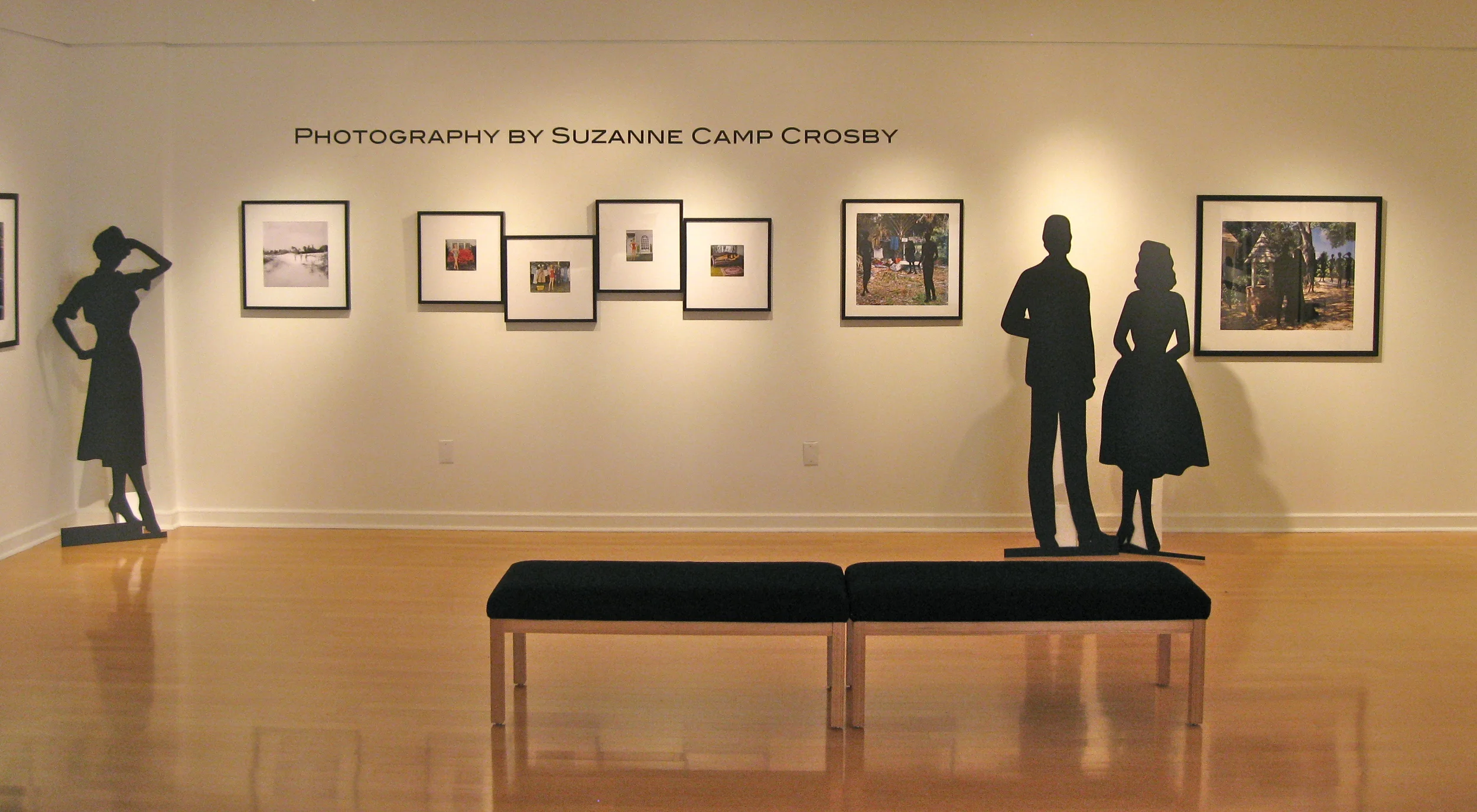 Suzanne Figures featured over 40 pieces by Suzanne Camp Crosby, of or relating to figures. Life-sized versions of her antique paper dolls were created to stand alongside their framed counterparts - as seen in Gallery 221@HCC, 2013 Spring, Dale Mabry campus - curated and designed by Katherine Gibson.