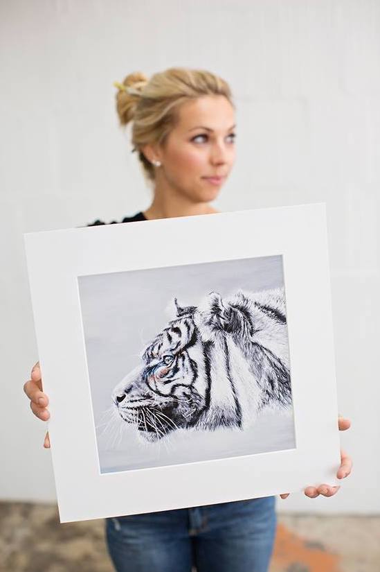 Ali Armstrong holding Sumatran tiger