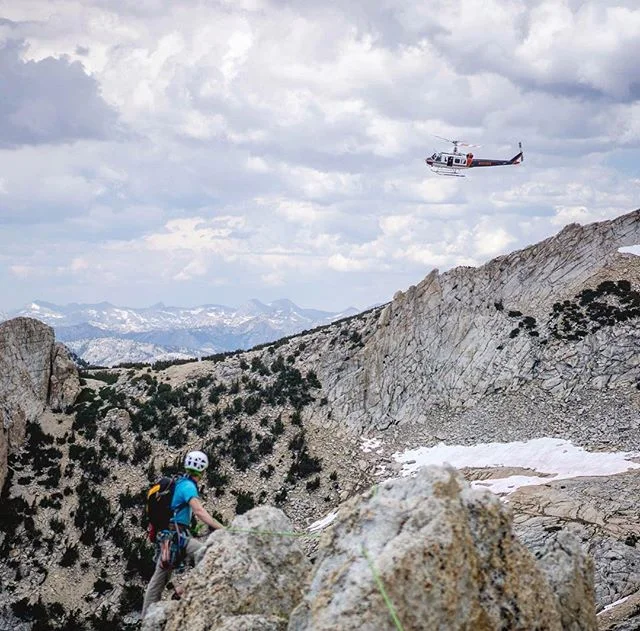 Angels of Yosemite // Yosemite Search and Rescue circling over us on Matthes Crest searching for the fallen climber.  Although we're still waiting for an accident report to be released to confirm the details, we've heard that a climber took a lead fa