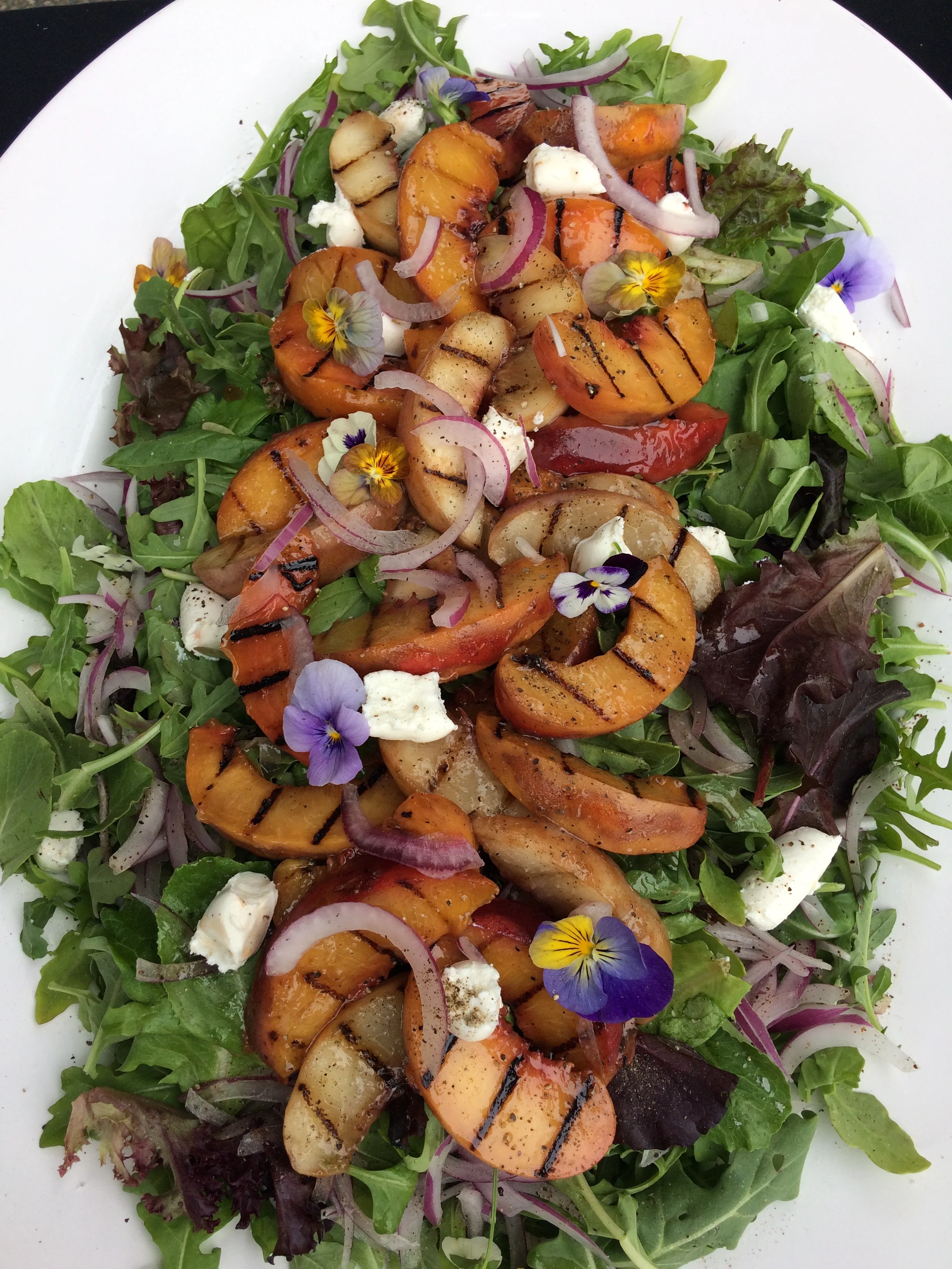 Summer Salad- Grilled StoneFruits, Organic Greens, Shaved Red Onion, Harley Farms Goat Cheese, Berry Vinaigrette