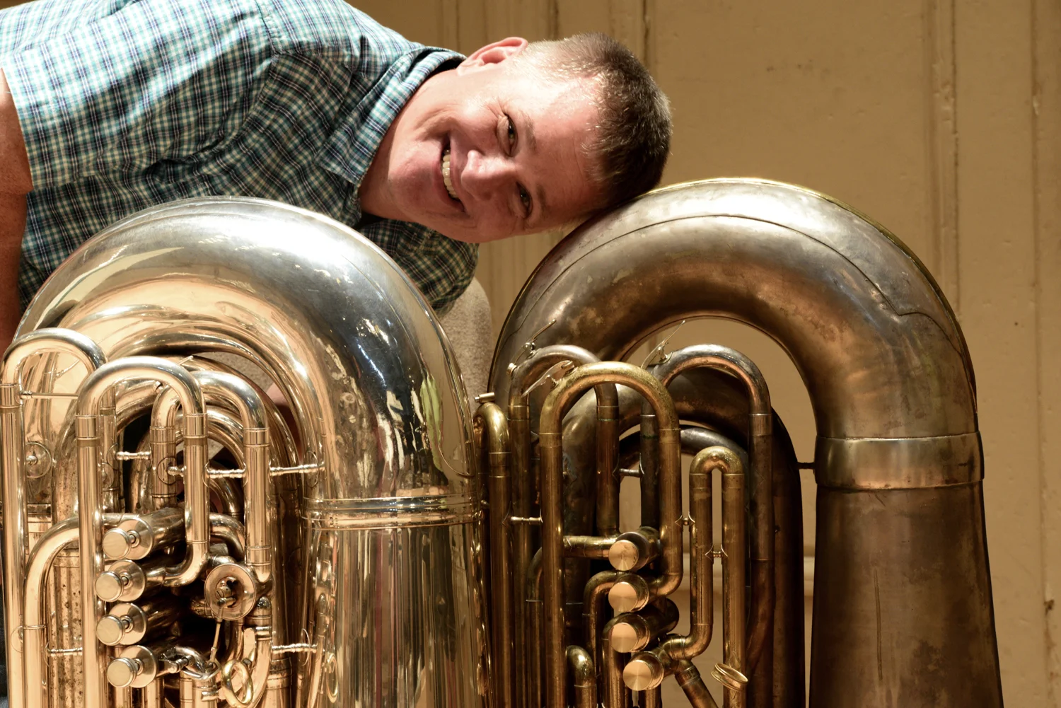 Mike Roylance poses midweek with the two tubas he tried out for Tchaikovsky No. 6. (Left to Right) Nirschl 6/4 CC and 1920's era Holton BBb.