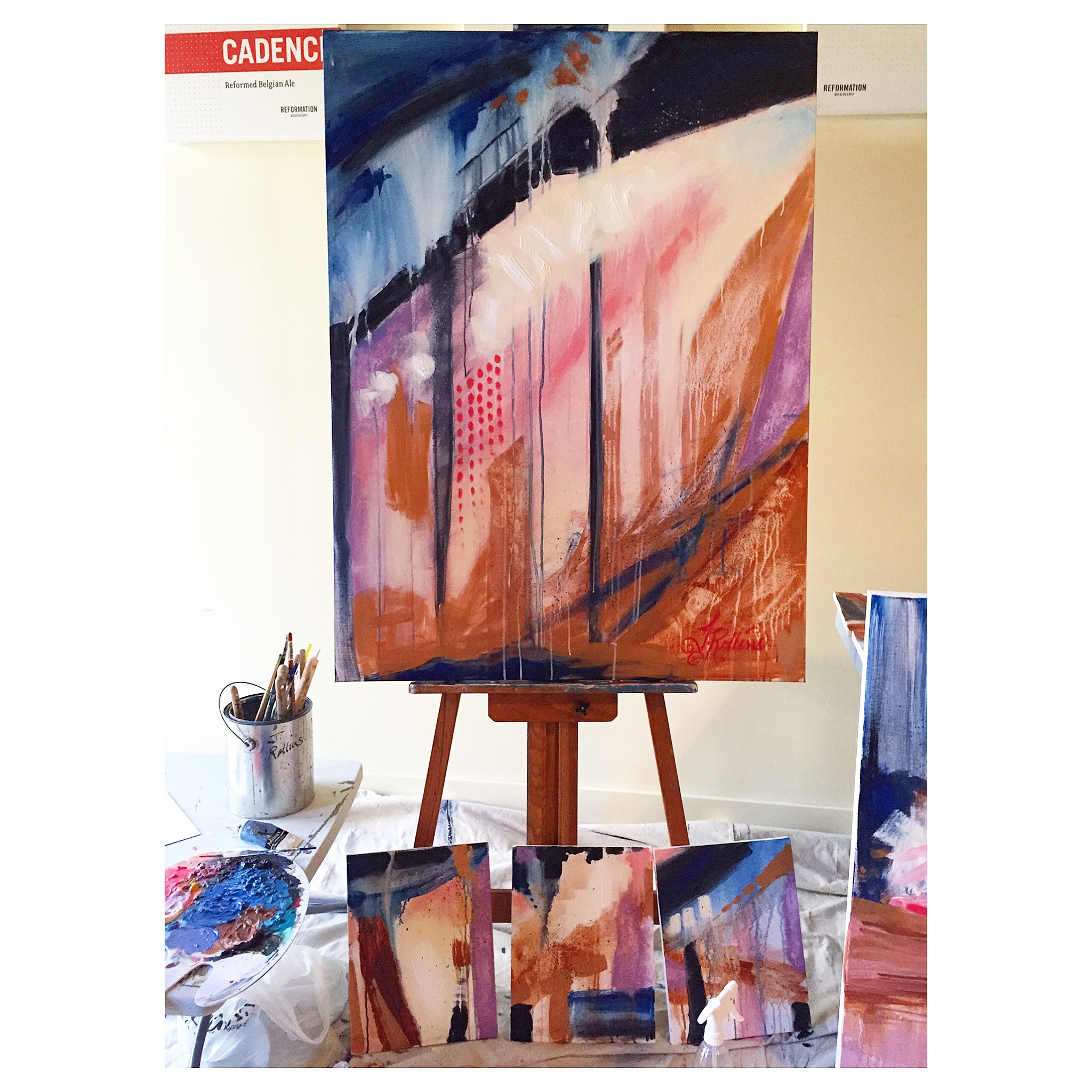 Main large piece with the smaller ones leaning against the easel.