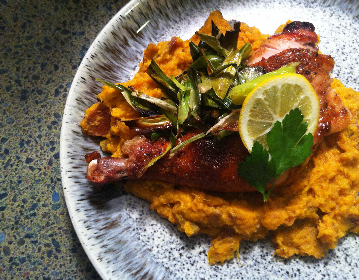 Honey bourbon glazed chicken with smashed sweet potatoes, charred leeks, meyer lemon.