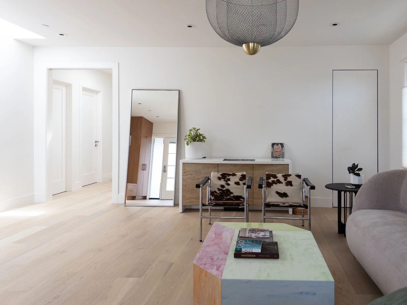  Renovated living room with new windows and skylight inserted 
