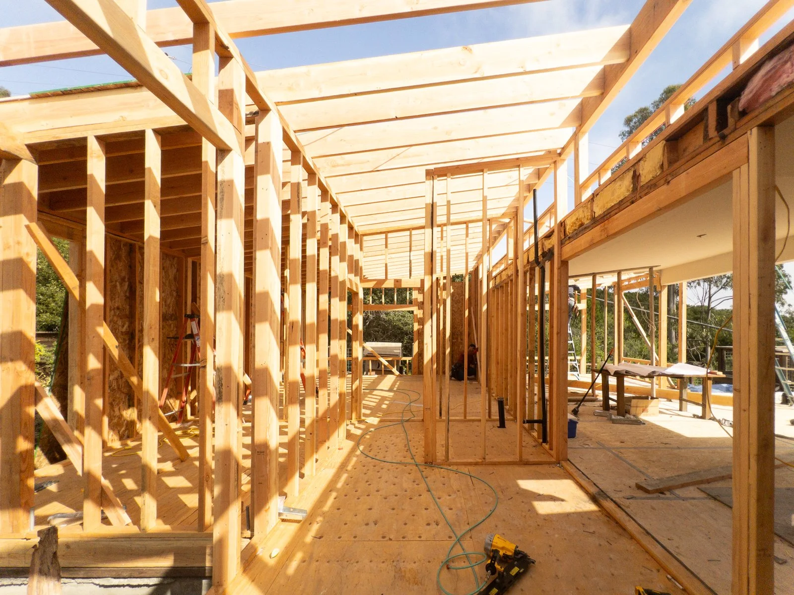  New entry vestibule with natural light and view through open living space to San Francisco Bay 