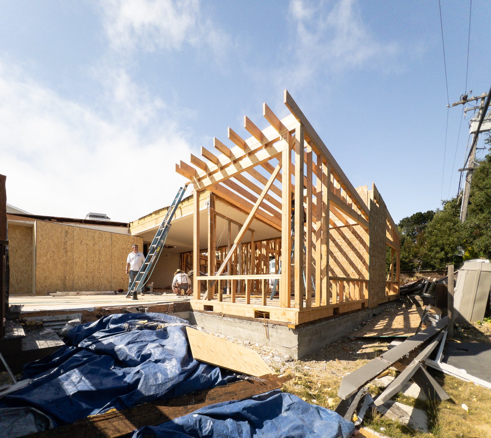  Family room addition at rear of house. Roof pitches towards exterior wall to maximize sweeping bay views 