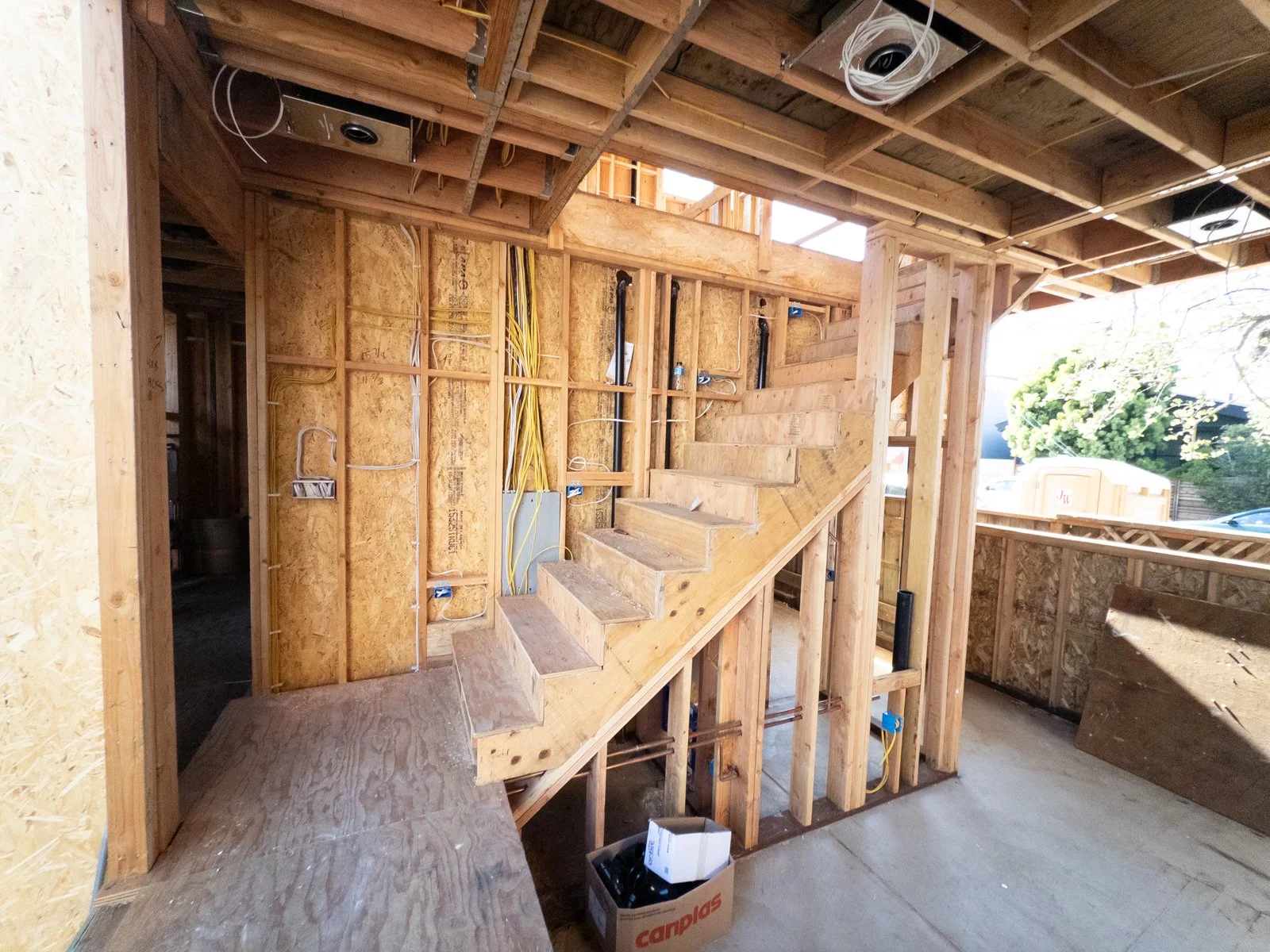  View of sitting room with eleven foot ceilings during framing 