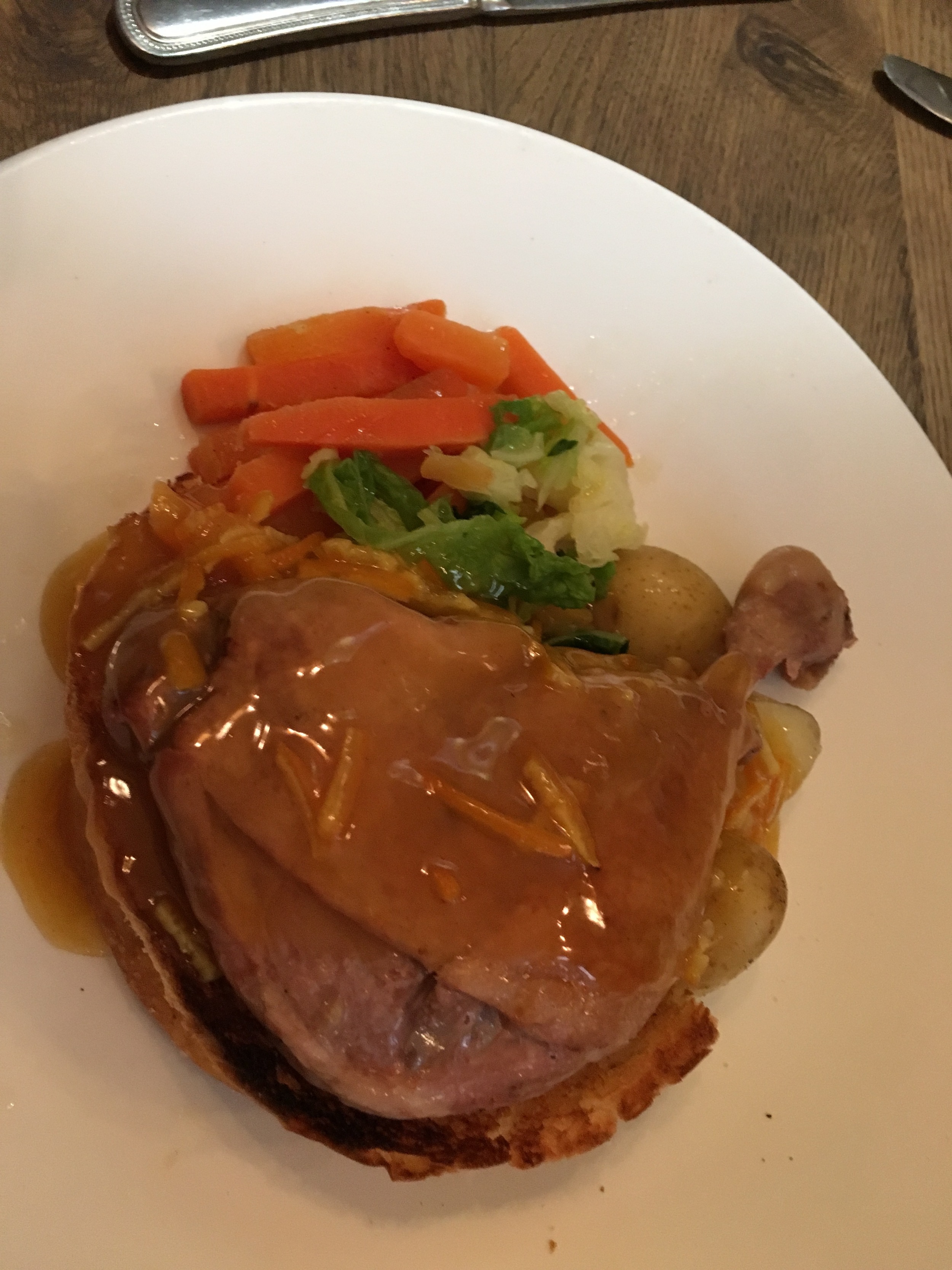  Duck à l'orange with a slice of Sally Lunn bun and some veggies. 